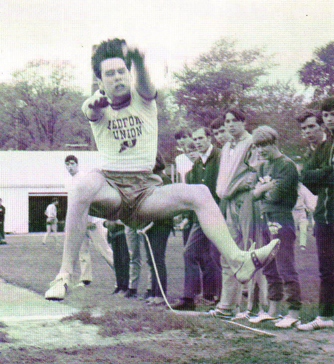 Vic Corts jumps for a school record